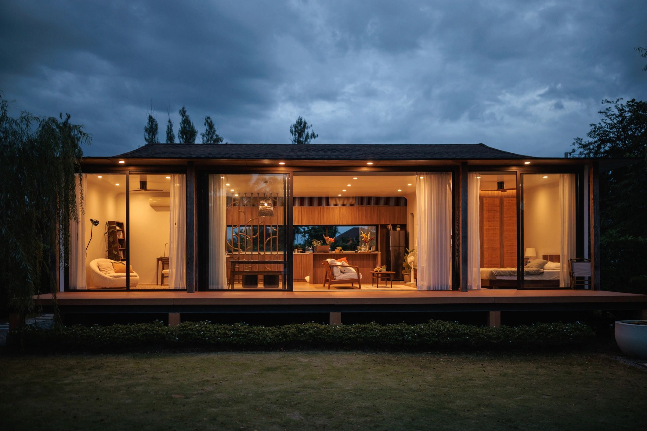 Exterior of a modern rental home at dusk
