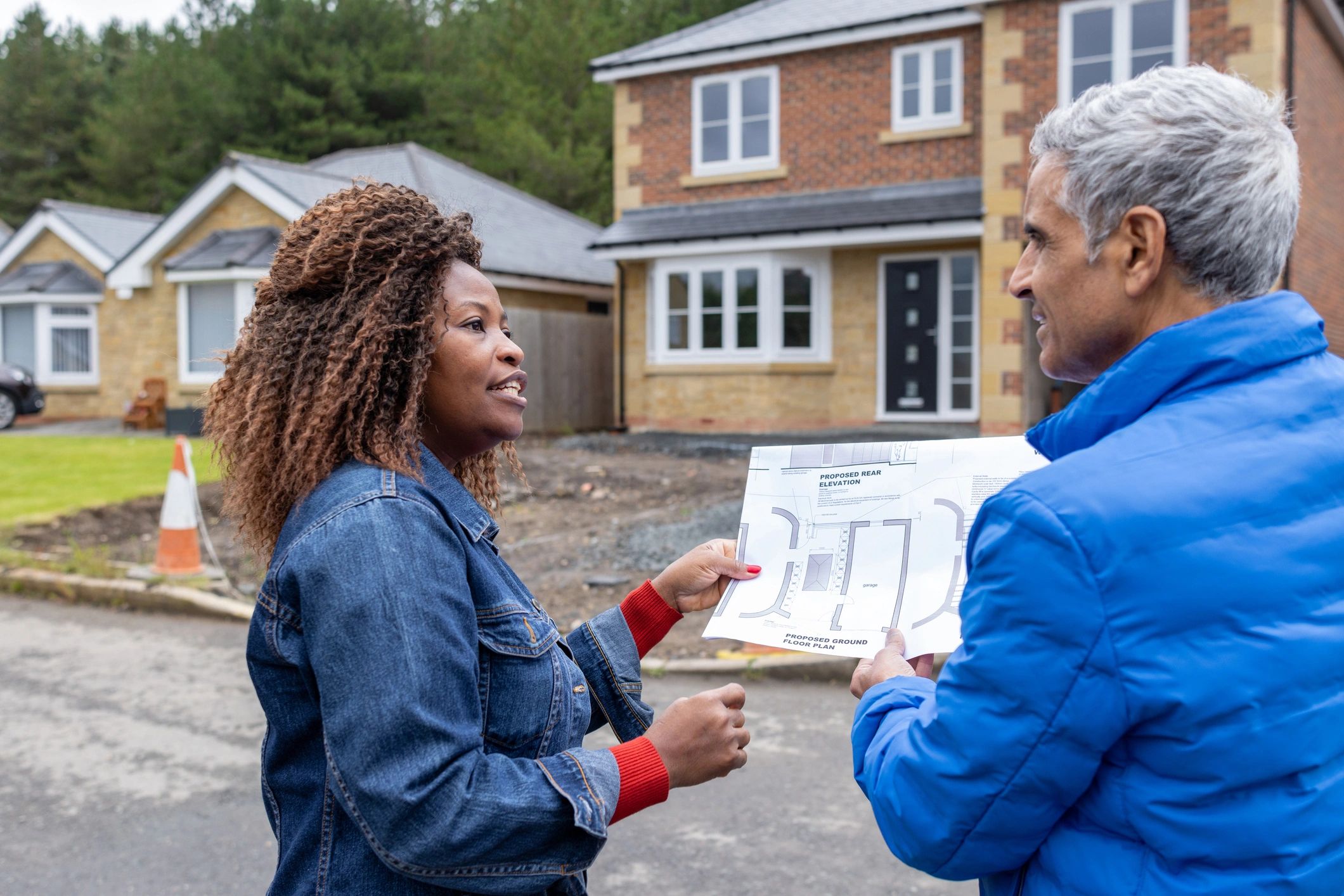 Real estate advisor reviewing relocation plans with a client